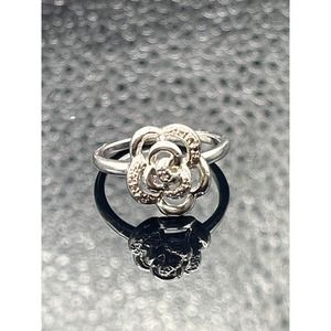 Sterling Silver Flower ring set with Genuine Diamonds stamped SAI 925